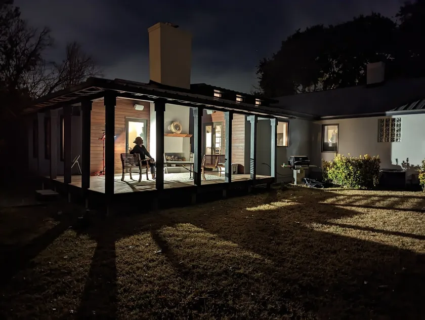 Screened room at night, lit from within, in use